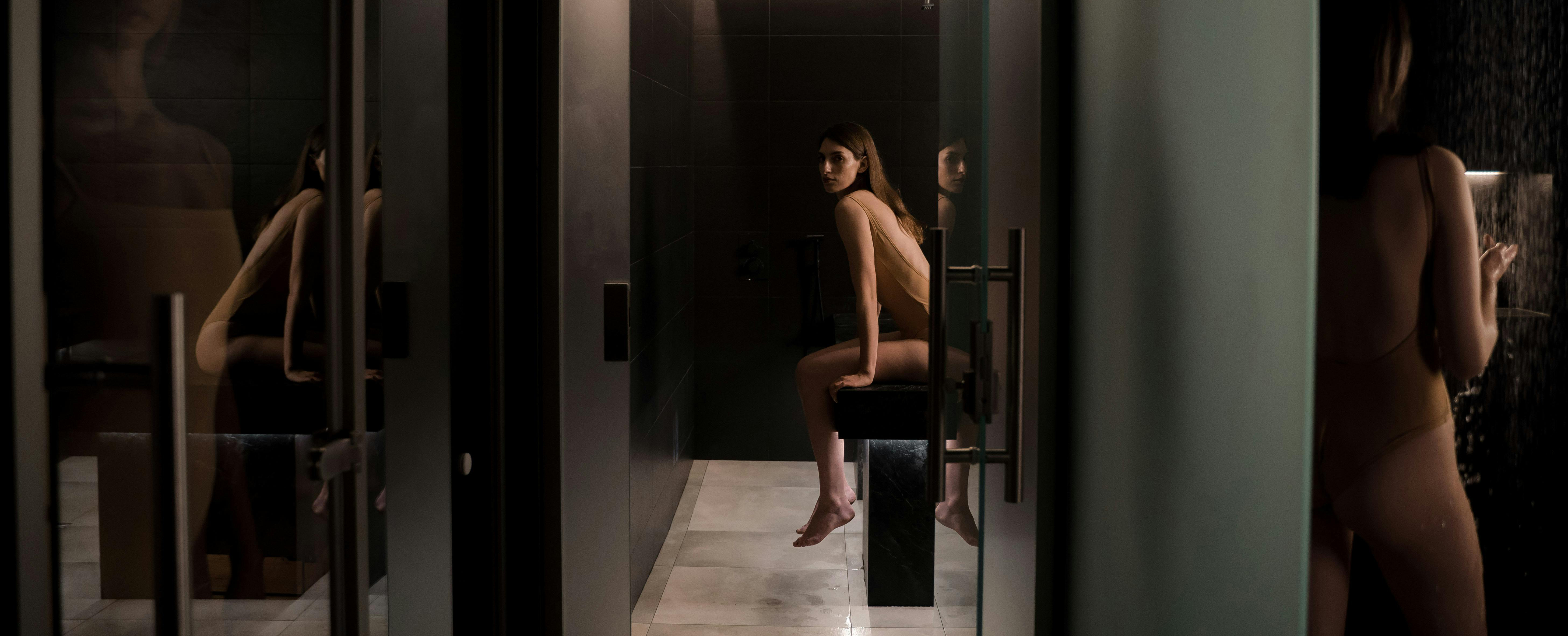 A relaxing spa-like atmosphere with candles and stones.